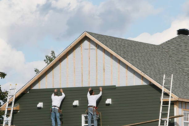 Professional Siding technician working in Fulton, IL
